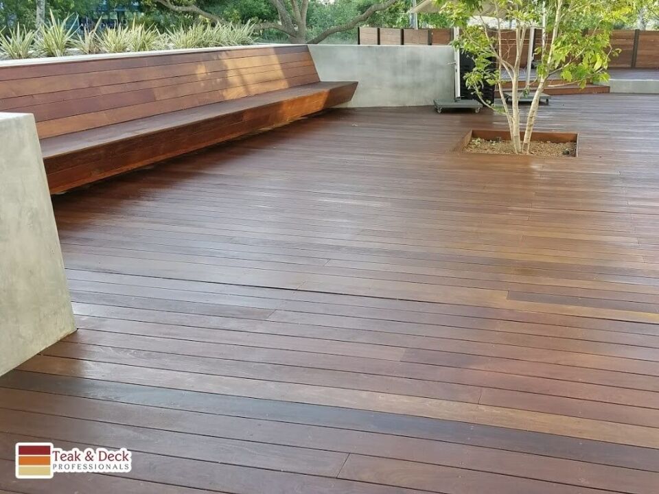 Restored and sealed exotic ipe wood deck with built-in bench seating