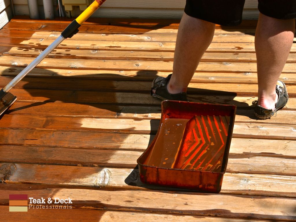 Apply sealant to wood deck