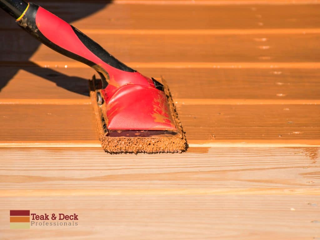 Apply sealer to wood deck